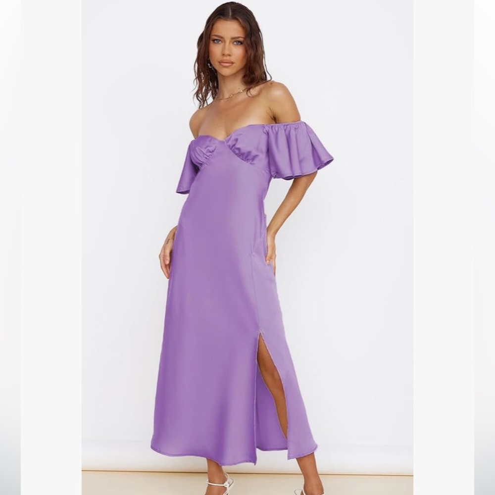 Brand new with tags size medium lilac wedding guest dress. Satin